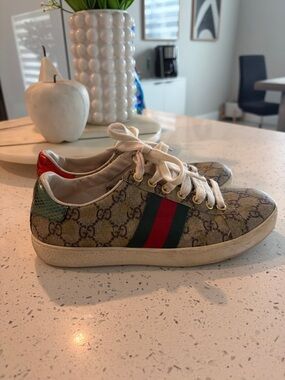 Gucci Monogram Low-Top Sneakers with Red and Green Metallic Heel
